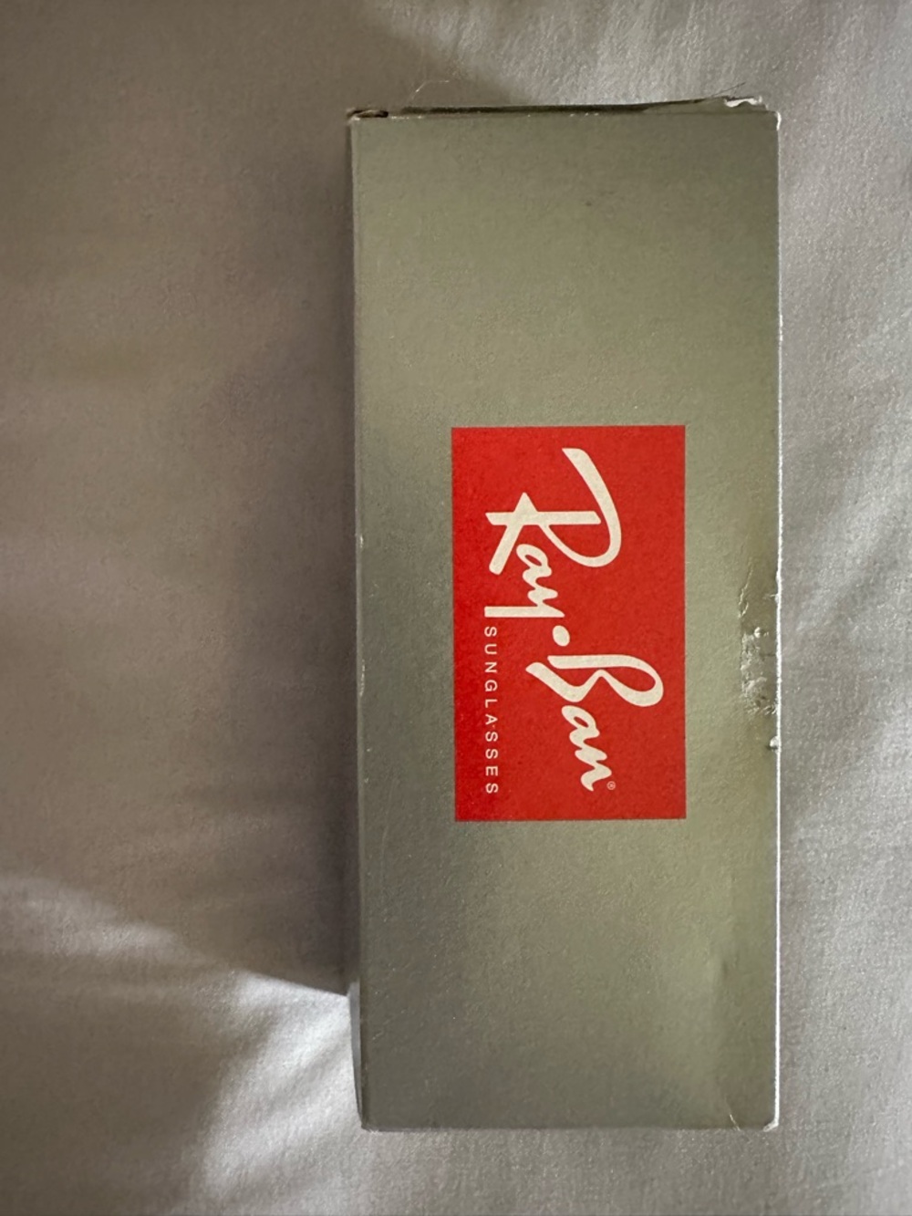 Ray-Ban Silver Box with Red Logo and Black Sunglasses Graphic